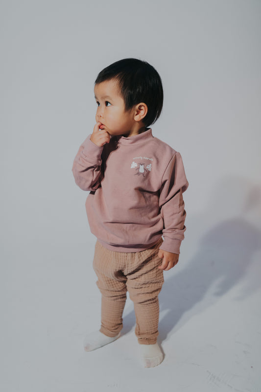 Sweater "Otterly Adorable" rosa